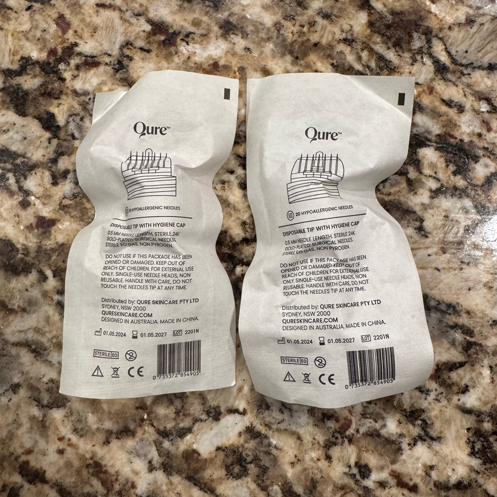 New/sealed Qure .5mm stamping heads x2